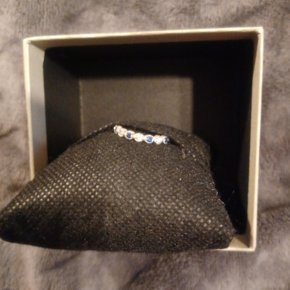 Sterling silver 925 Blue Sapphire and Cubic Zirconia ring. Size 7.